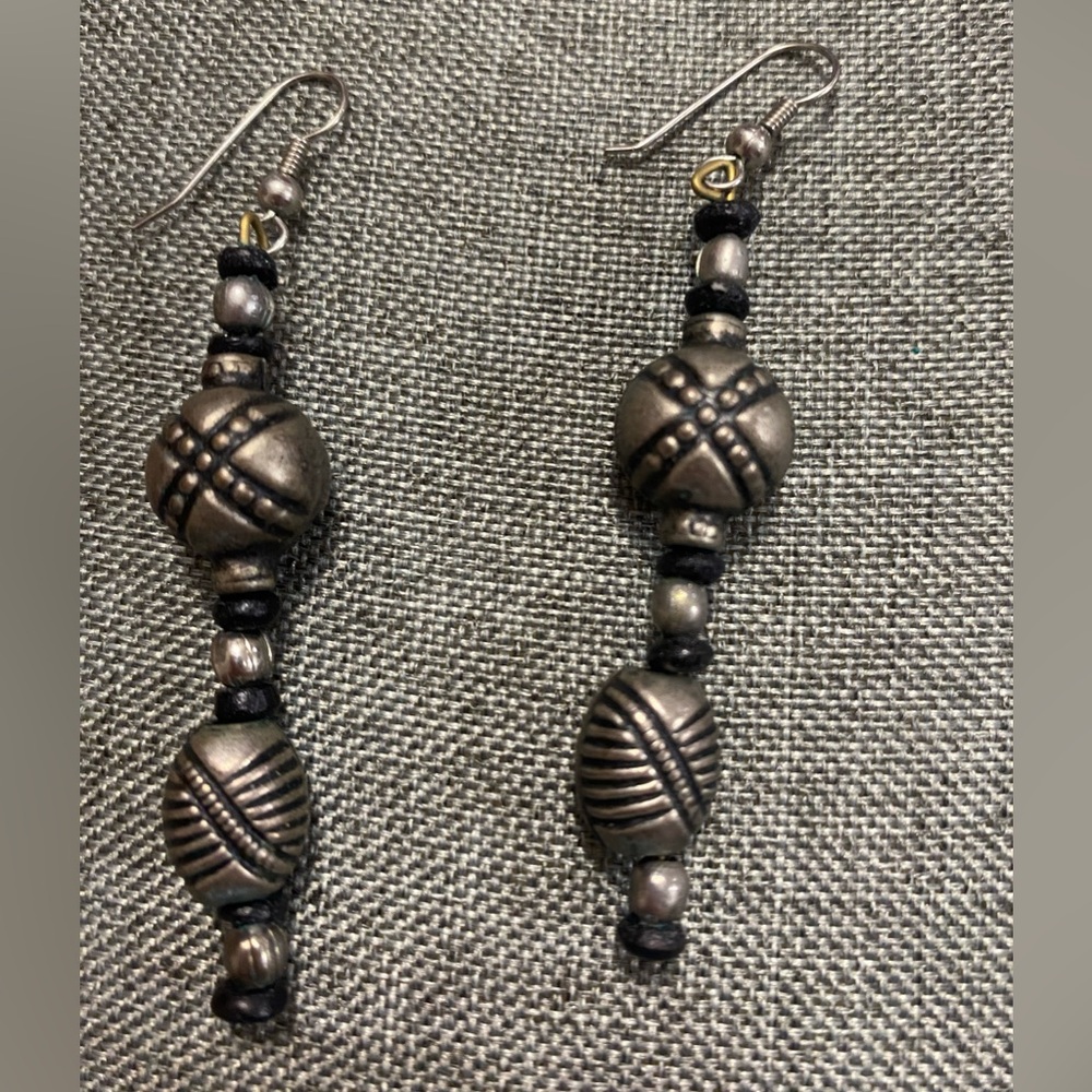 Gunmetal colored & black beads dangle pierced earrings.Approximately 3-1/4”long.